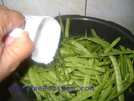 Add Cluster Beans and Water in the pressure cooker.